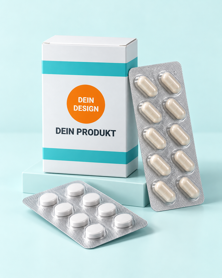 Blisterkarten mit Hartkapseln und Tabletten neben einer weißen Faltschachtel – Verpackungsvisualisierung.